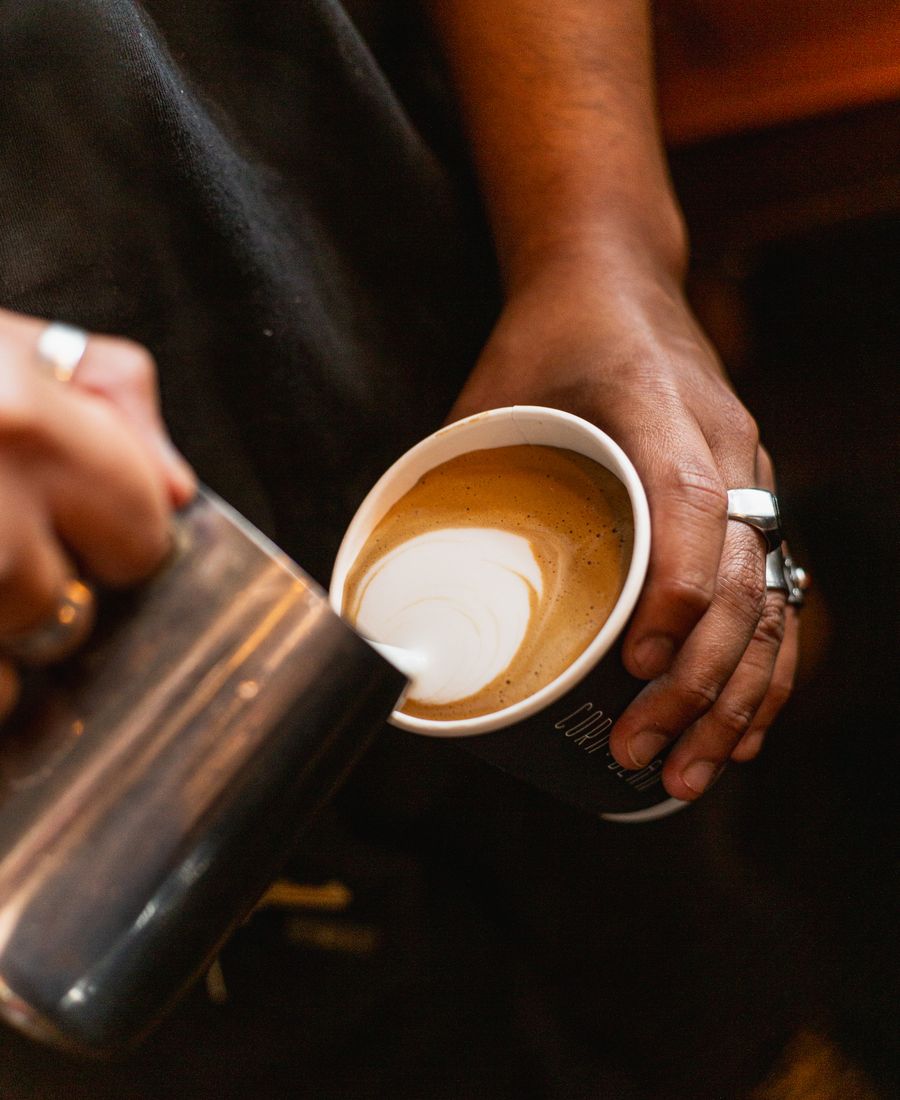 Latte art being poured